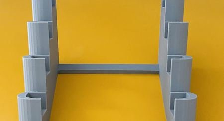 Vue de dessus du présentoir vide montrant sa structure imprimée d'un seul tenant